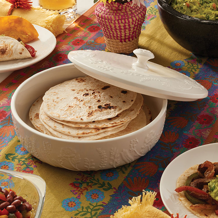 tortilla server with cover open, full of tortillas